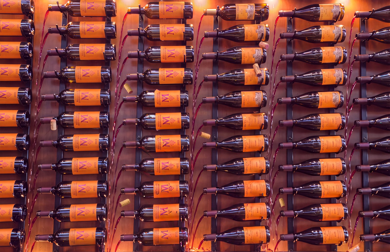 Uncorked Wine bottles in Motion